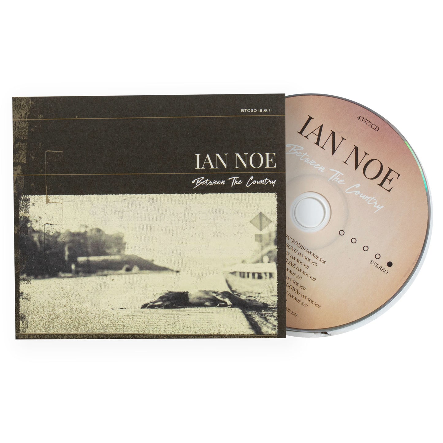 CD and cover of 'Between The Country' by Ian Noe on a white background