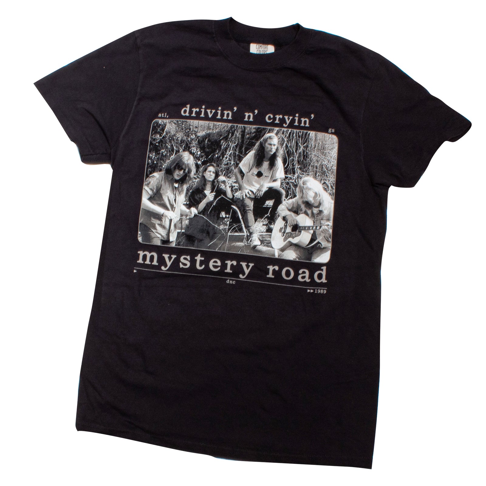 A black short-sleeve graphic t-shirt featuring a vintage-style black and white print of the band Mystery Road on the front, with the text 'drivin' n' cryin'' above and 'mystery road' below.
